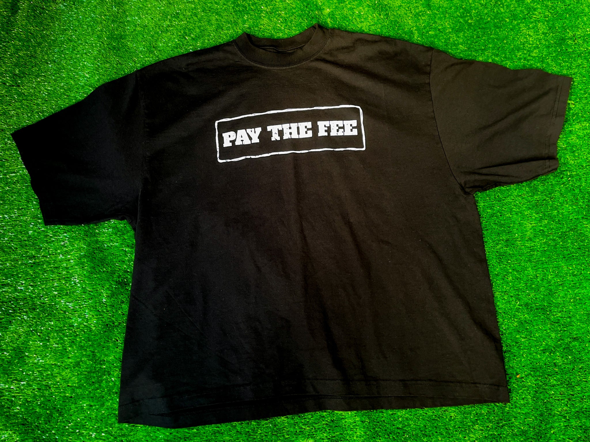 "PAY THE FEE" Off the Shoulder Shirt